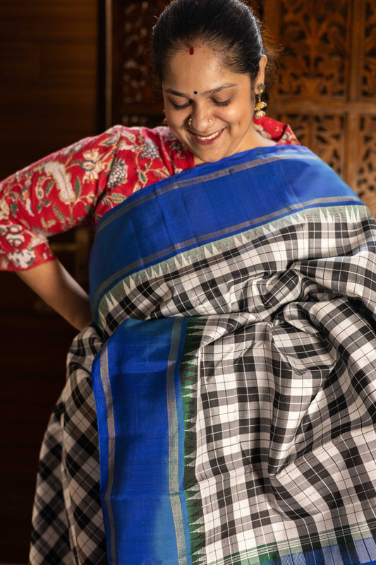 Vintage Black & White Paalum pazhamum checks with Mayil kazhuthu Korvai Border