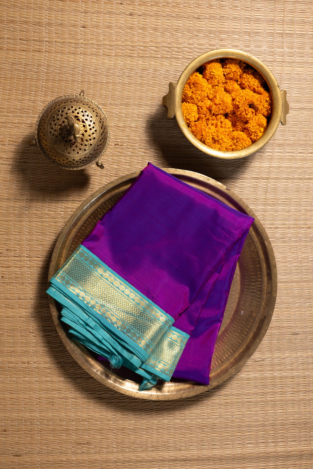 Karthirikai violet with teal blue small border