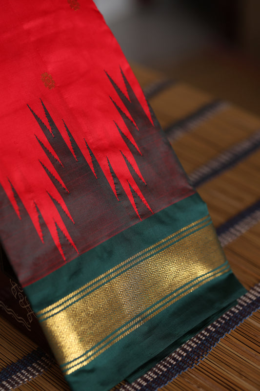 Red with dark bottle green and pallu