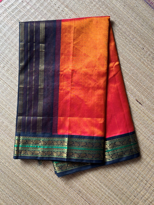 Burnt orange with black kodi border and pallu