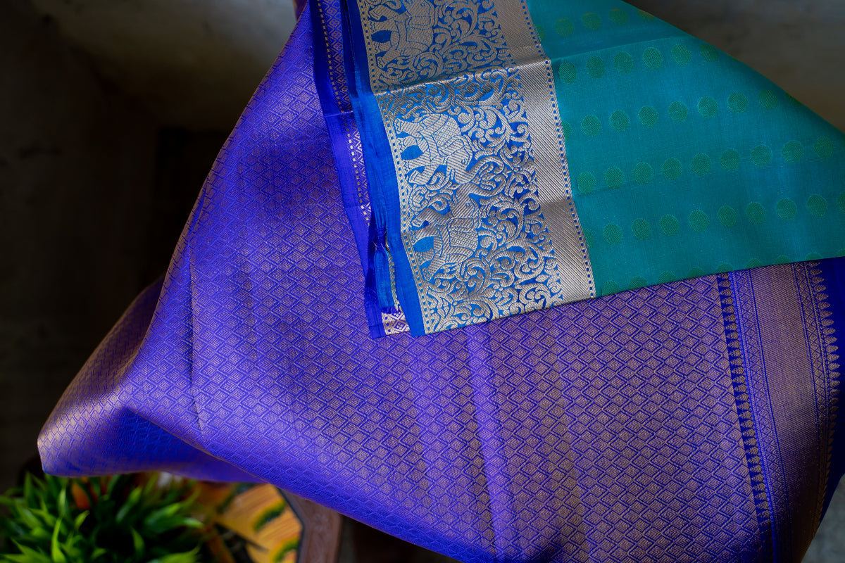 1000 Butta peacock blue with violet (Deepika Model)