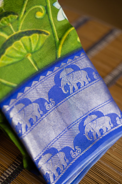Leaf green crepe saree with pichwaI print