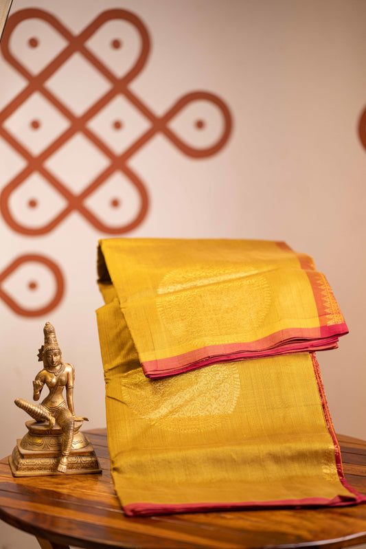 Vendhayam Golden colour with maroon pallu- big  chakram motifs