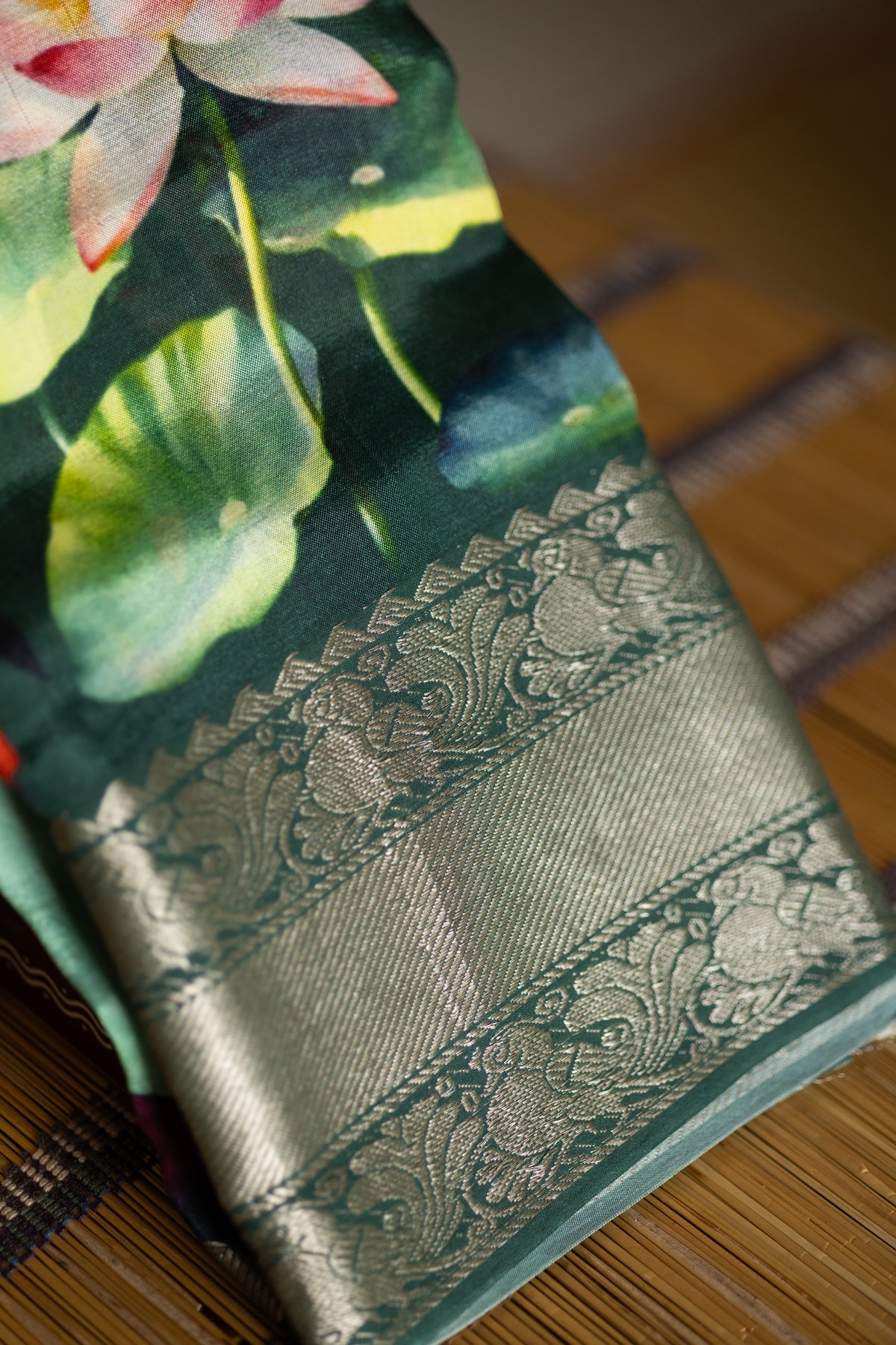 Bottle green crepe saree with pichawaai print