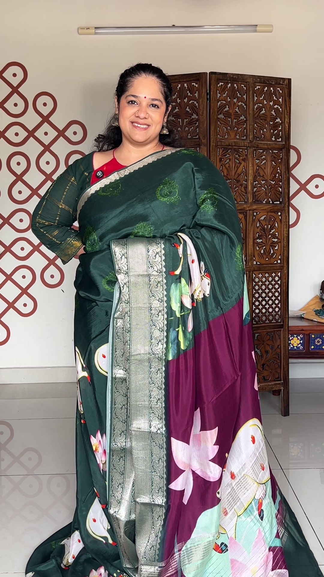 Bottle green crepe saree with pichawaai print