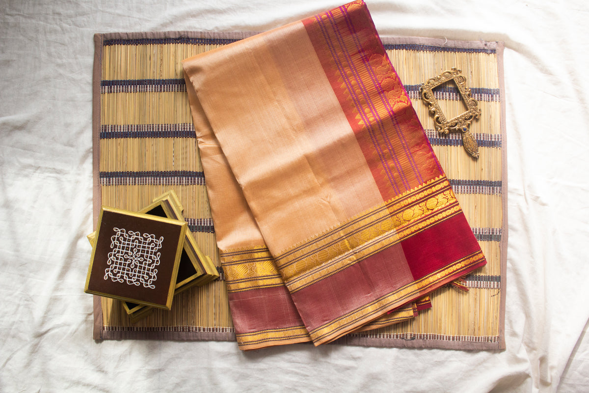 Cream with maroon rettaipet border