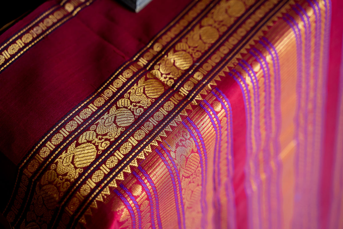 Cream with maroon rettaipet border