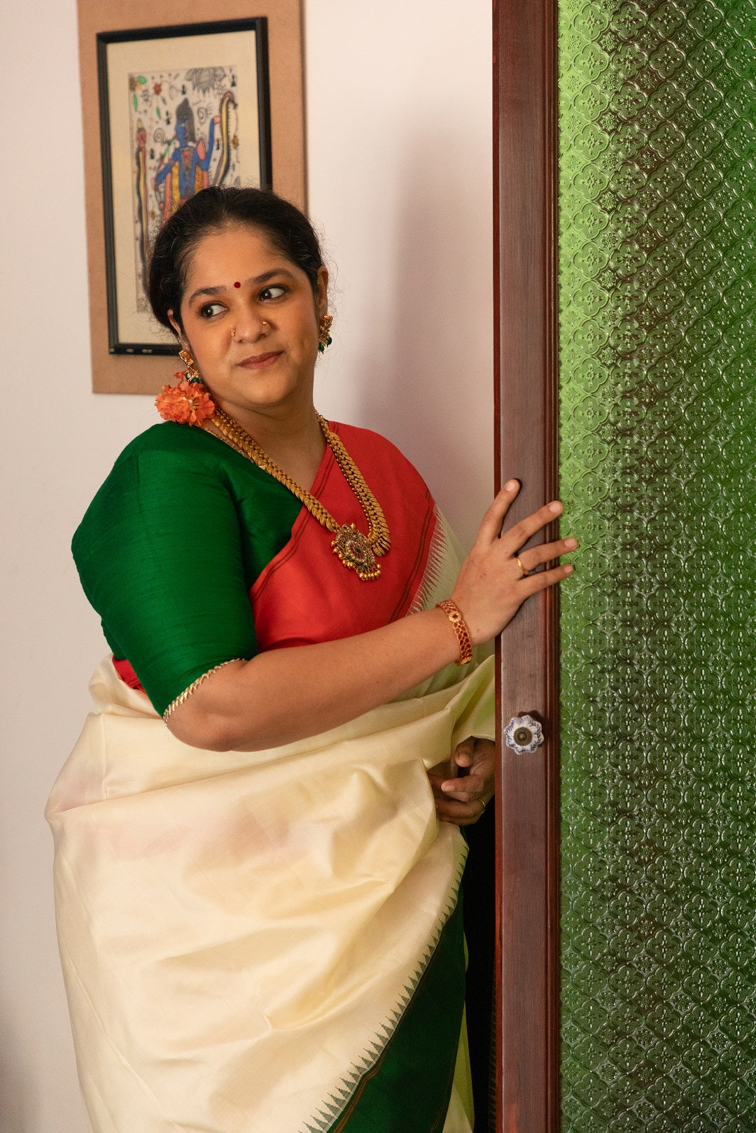 Half white with Orange and Green Ganga Jamuna Border (with Green Pallu)