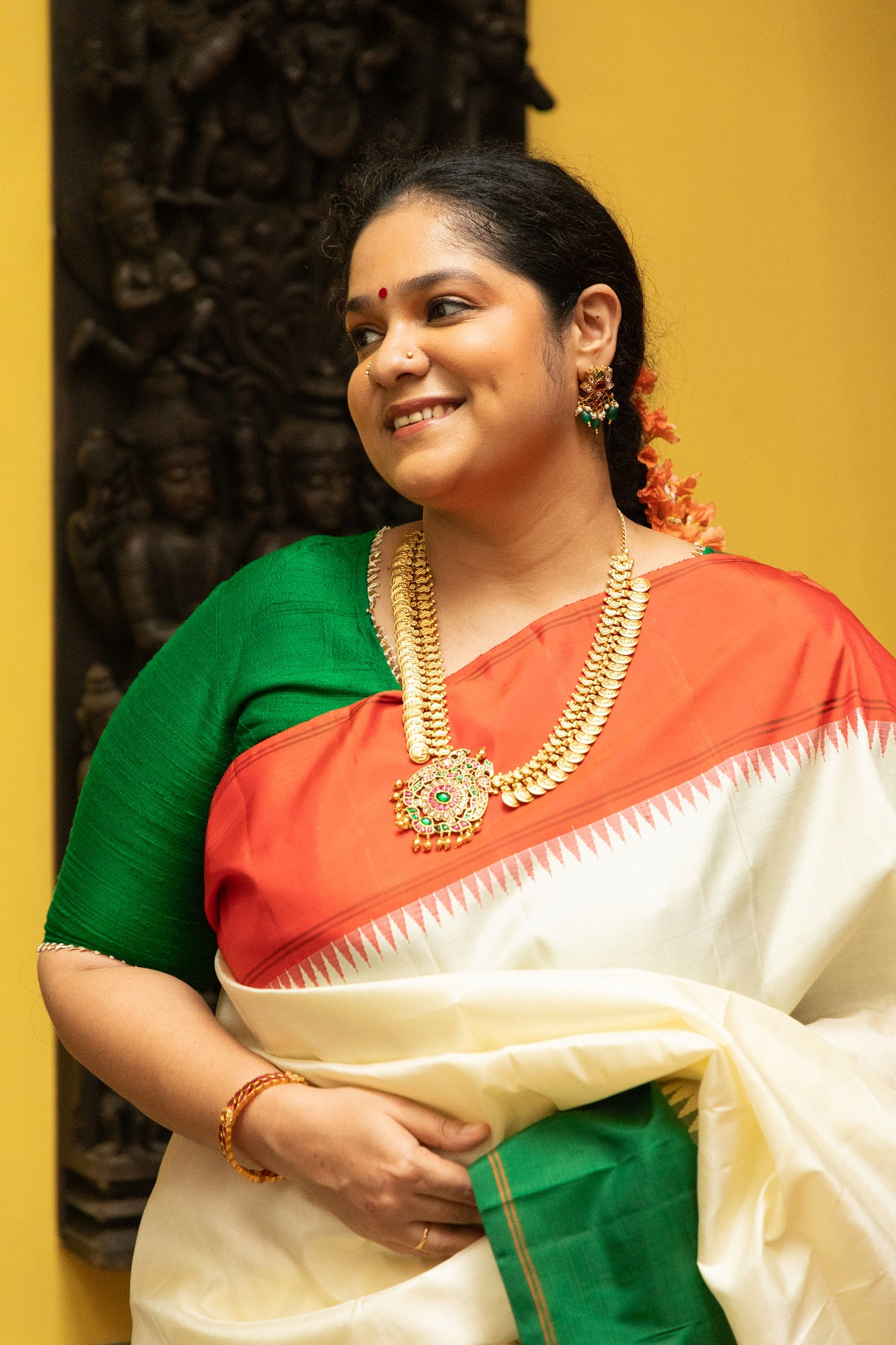 Half white with Orange and Green Ganga Jamuna Border (with Green Pallu)