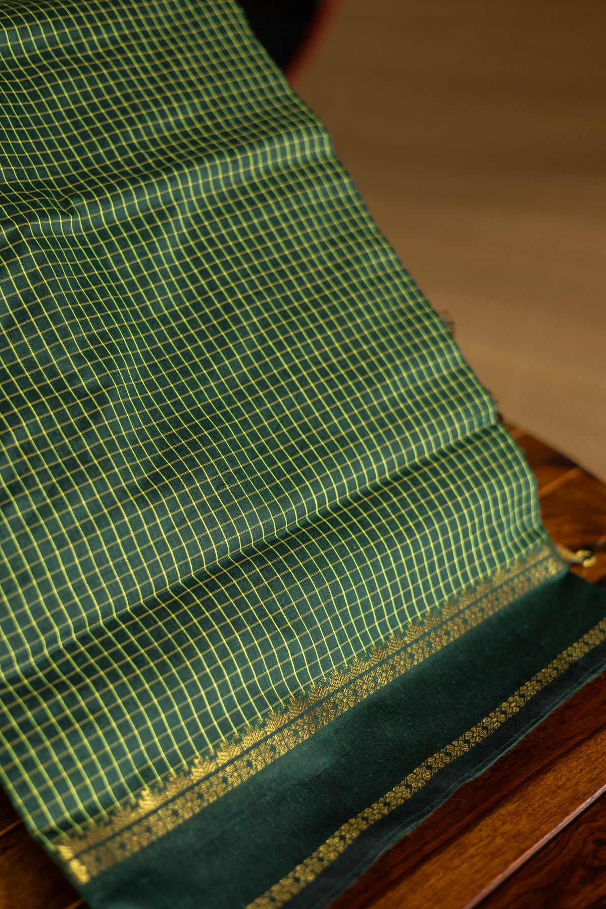 Dark Bottle Green Arani Semi Silk Cotton Muthukattam Saree with Rettaipettai Border