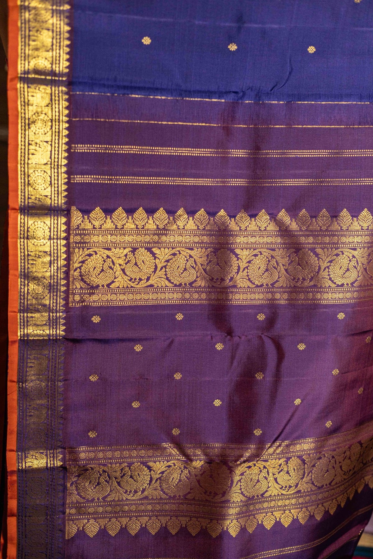 Royal Blue with rust orange Selvedge and elephant border