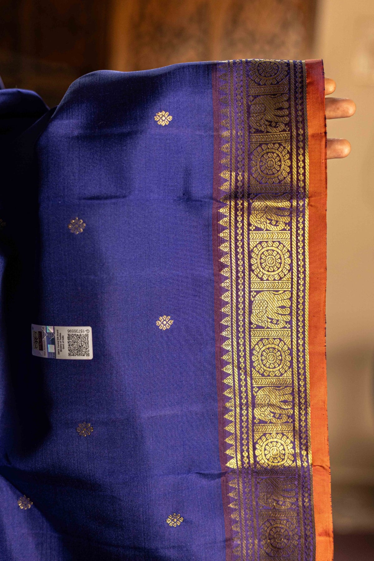 Royal Blue with rust orange Selvedge and elephant border