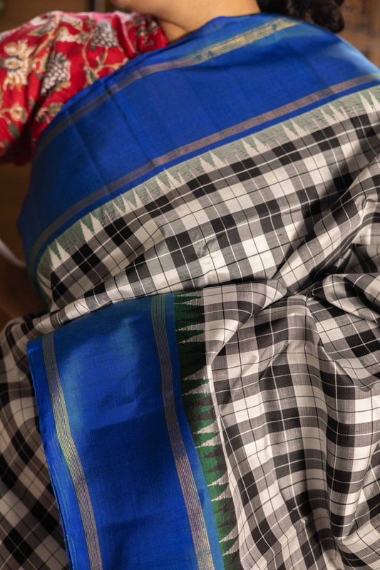 Vintage Black & White Paalum pazhamum checks with Mayil kazhuthu Korvai Border