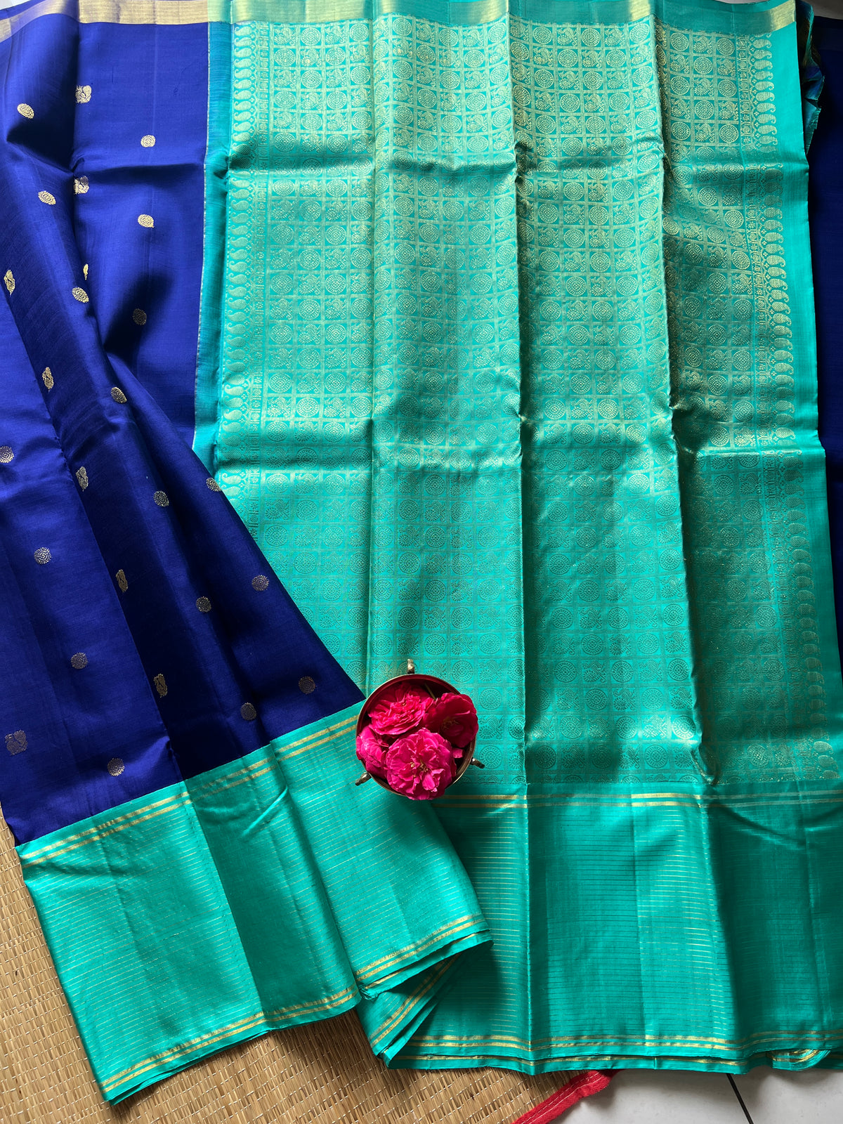 Navy blue with turquoise blue annam, chakram motifs with vaira oosi border