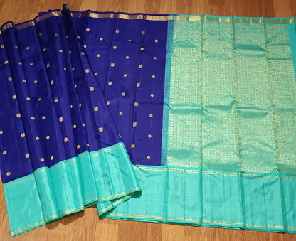 Navy blue with turquoise blue annam, chakram motifs with vaira oosi border