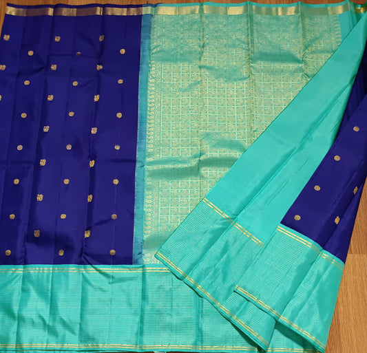 Navy blue with turquoise blue annam, chakram motifs with vaira oosi border