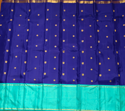 Navy blue with turquoise blue annam, chakram motifs with vaira oosi border