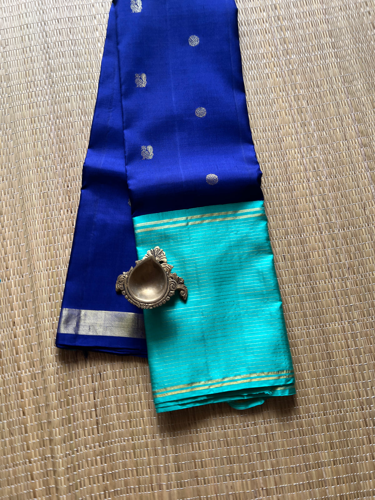 Navy blue with turquoise blue annam, chakram motifs with vaira oosi border