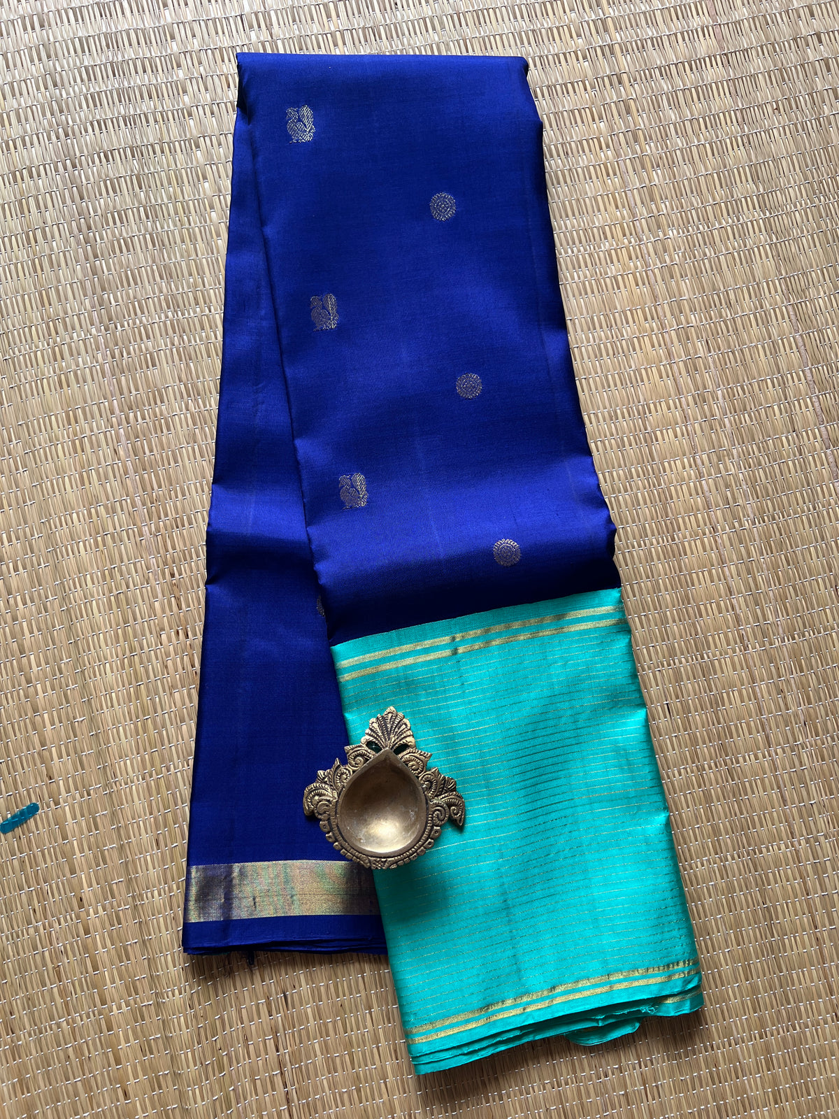 Navy blue with turquoise blue annam, chakram motifs with vaira oosi border