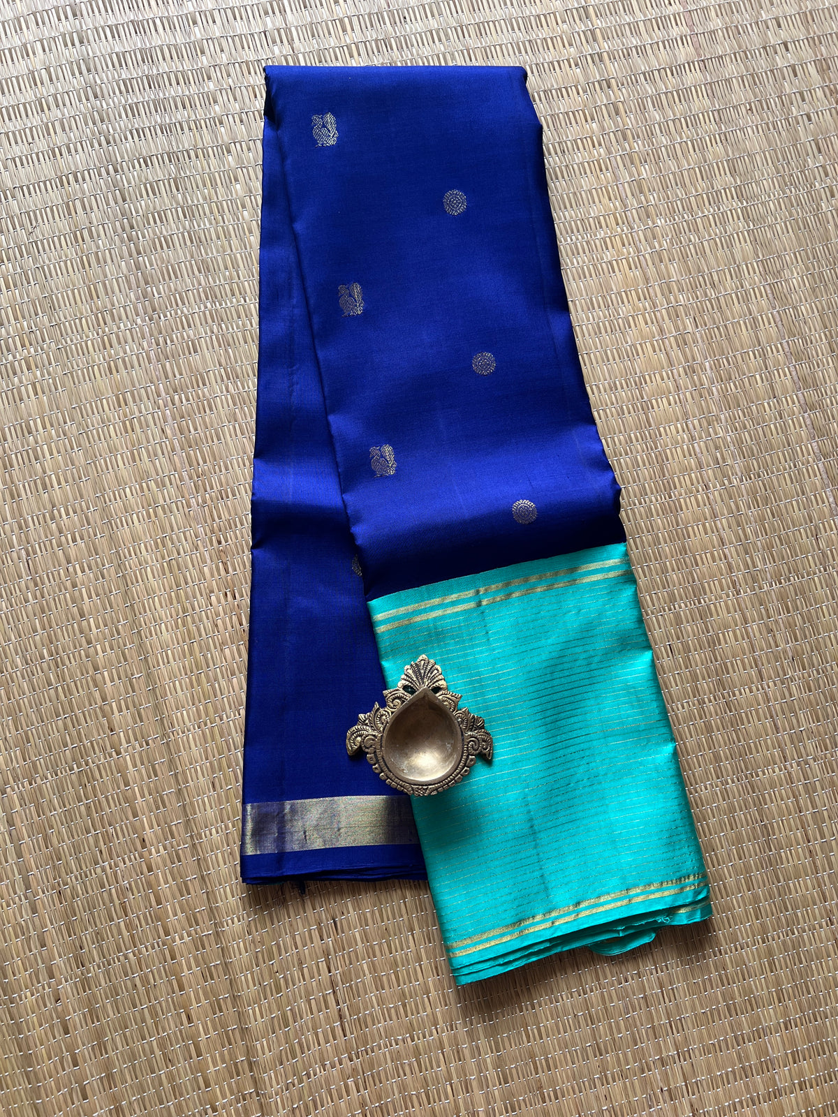 Navy blue with turquoise blue annam, chakram motifs with vaira oosi border