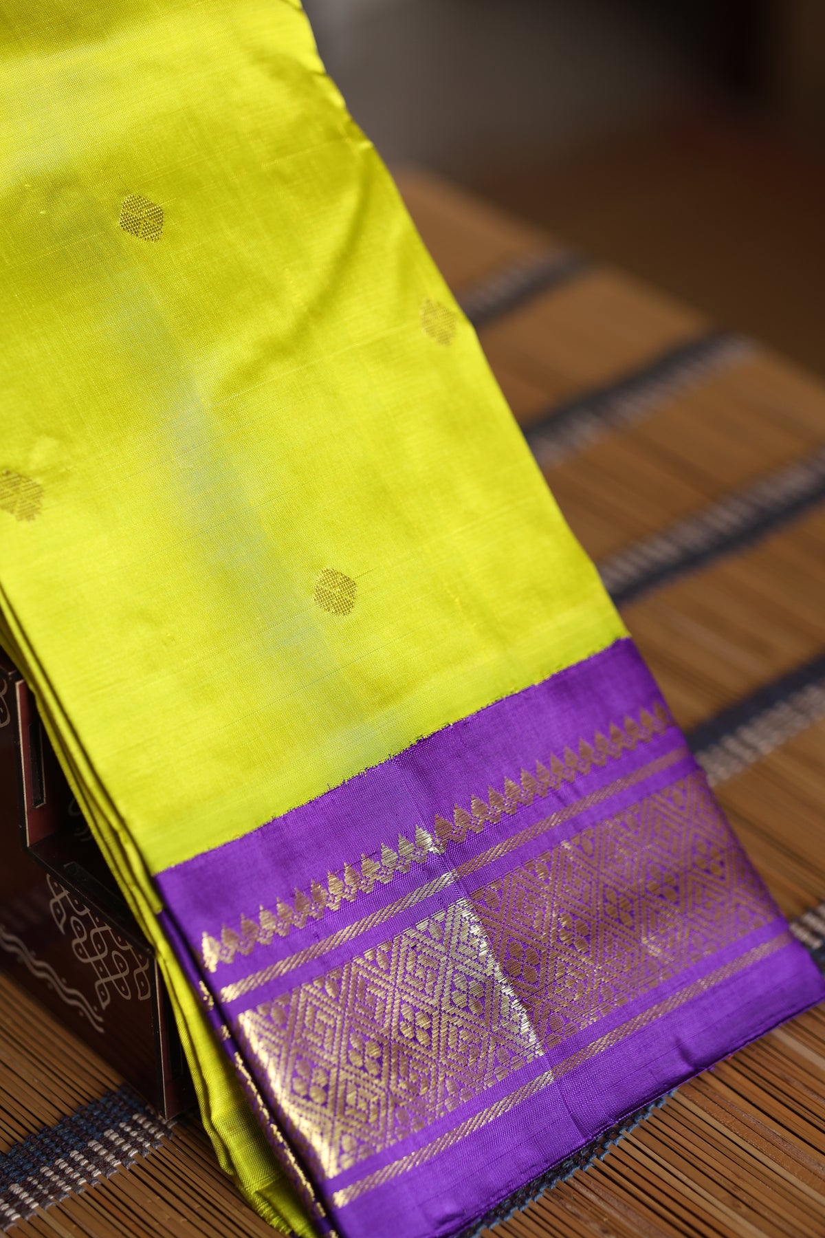 Parrot green with violet border and pallu