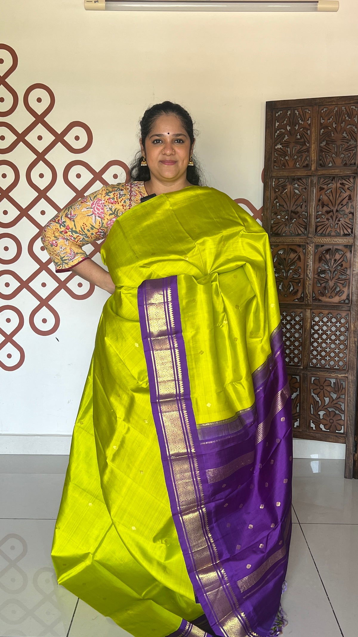 Parrot green with violet border and pallu