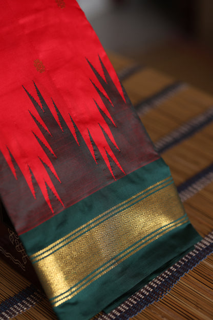 Red with dark bottle green and pallu