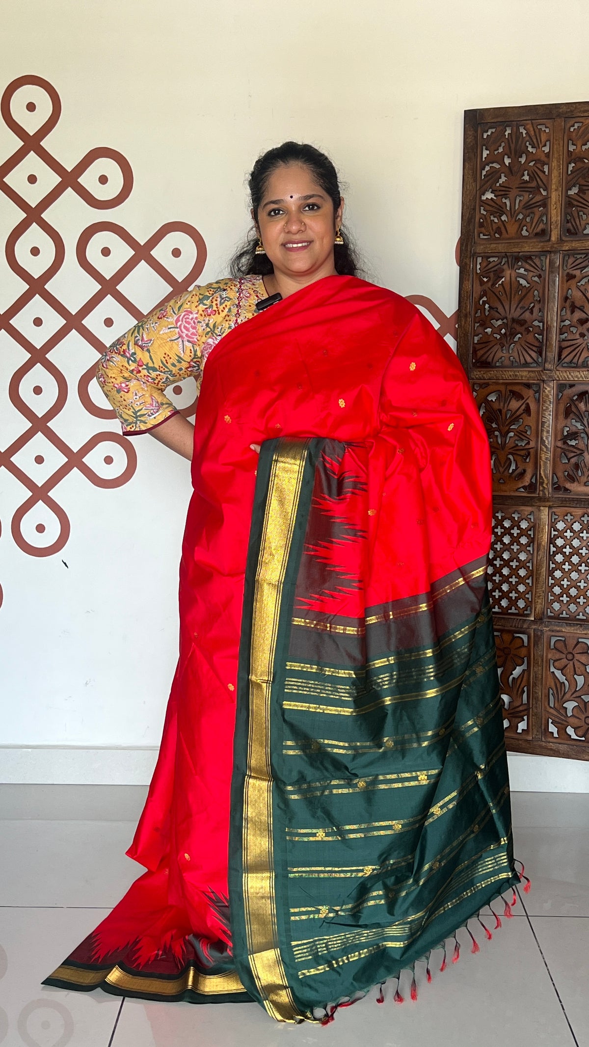 Red with dark bottle green and pallu