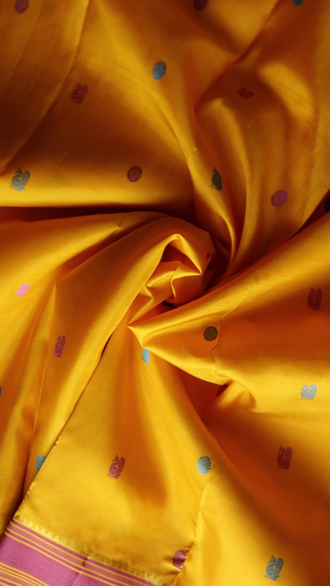 Turmeric Yellow with mauve pink thread work saree