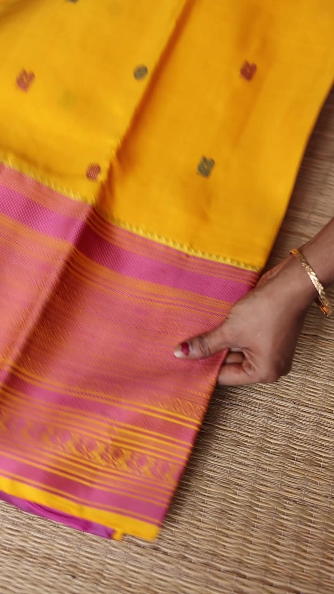 Turmeric Yellow with mauve pink thread work saree