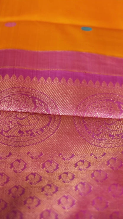Turmeric Yellow with mauve pink thread work saree