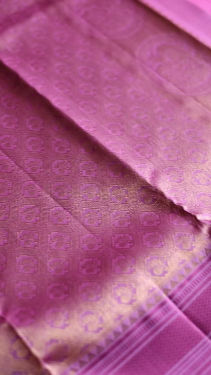 Turmeric Yellow with mauve pink thread work saree