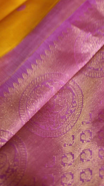 Turmeric Yellow with mauve pink thread work saree
