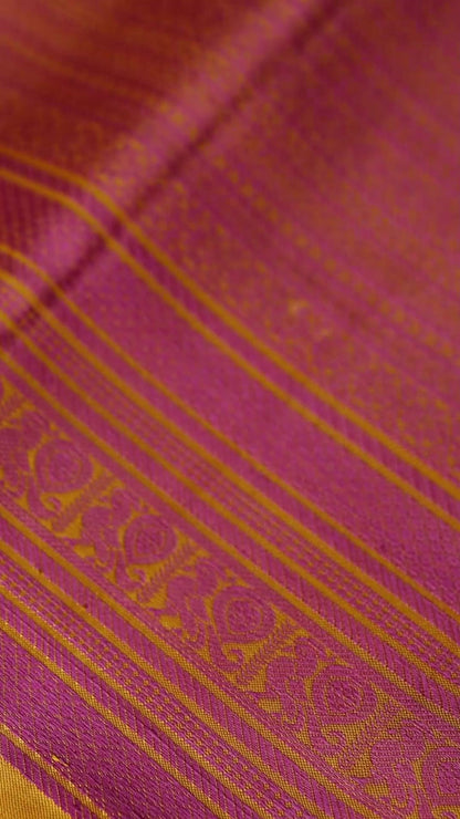 Turmeric Yellow with mauve pink thread work saree