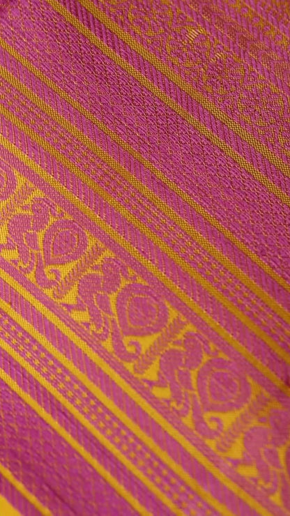 Turmeric Yellow with mauve pink thread work saree