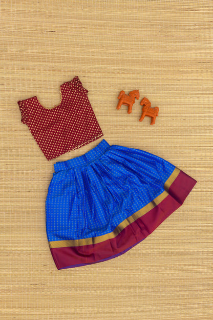 Maroon crop top with electric blue skirt
