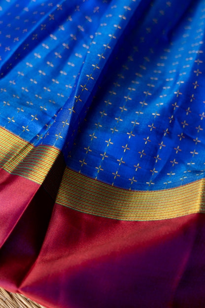 Maroon crop top with electric blue skirt