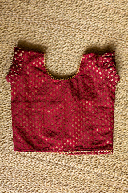 Maroon crop top with electric blue skirt